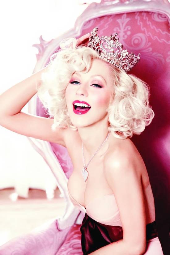 Christina Aguilera shows cleavage in photoshoot 2010 for Cosmopolitan - Hot Celebs Home