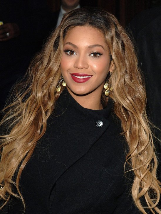 Beyonce always keeps it classy and understated, she uses a reddish berry that doesn't look too edgy