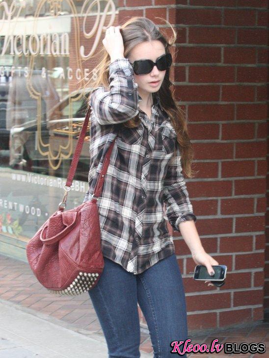 Lily Collins shows flannel is still always in style!