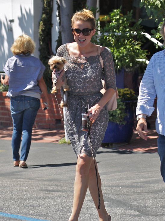 Amber Heard is a lady in gray lace and a chic updo