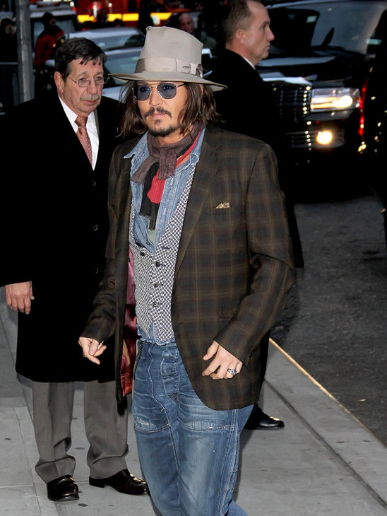 Johnny Depp has his own personal crazy touch to everything he wears!
