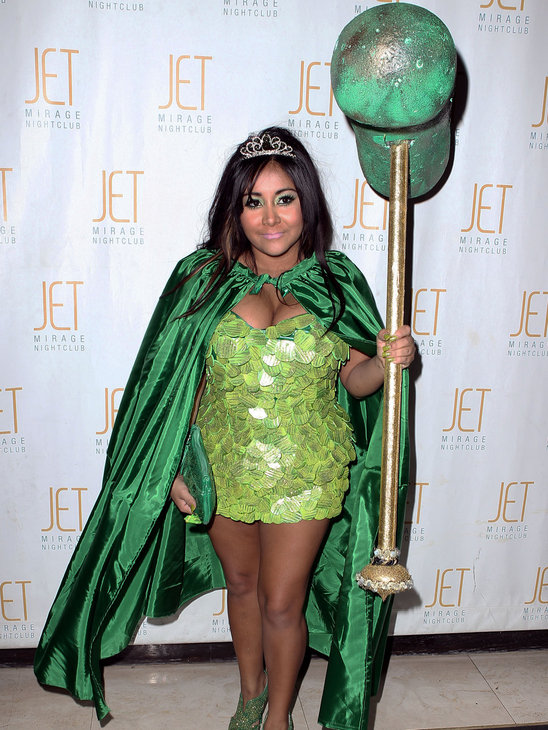 6. We are so proud of Jersey Shore-star Nicole Polizzi, more known as Snooki for choosing not to be slutty this Halloween! She actually looks more classy in this little pickle princess costume than she does in her tacky every day outfits. The costume fits her really well and she looks cute as a button!